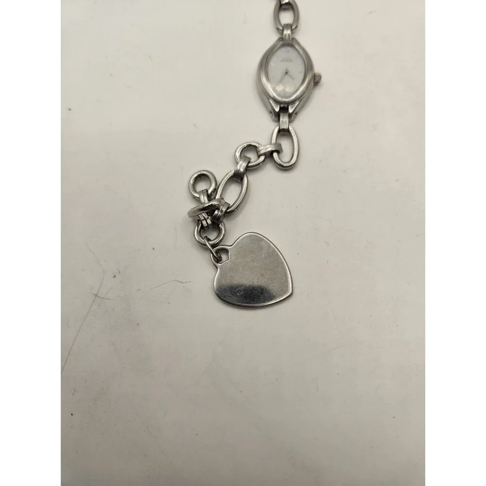 Citizen Eco-Drive Oval Silver Tone White Dial Heart Charm Bracelet Watch.